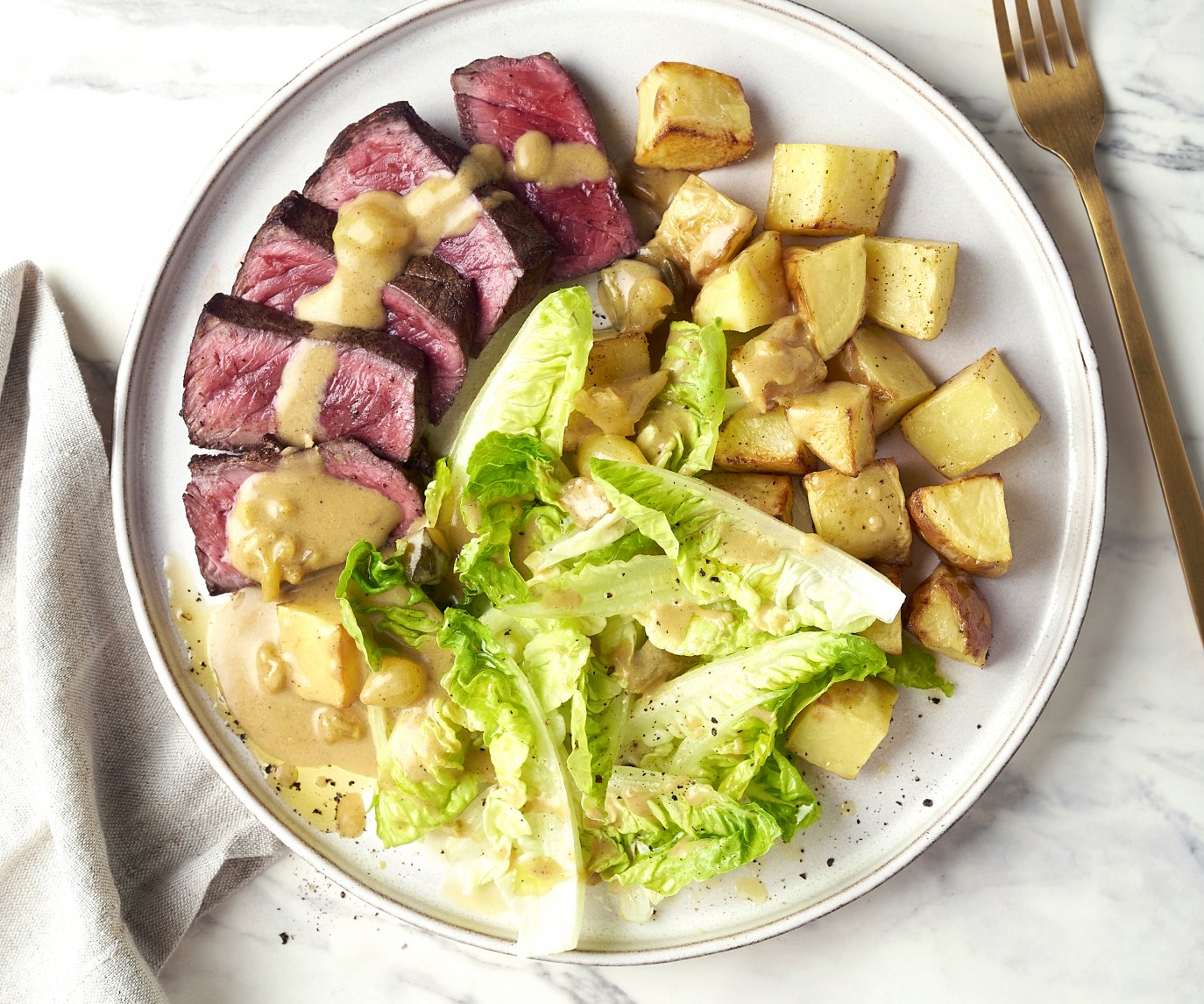 Steak met blackwellsaus en geroosterde aardappelen